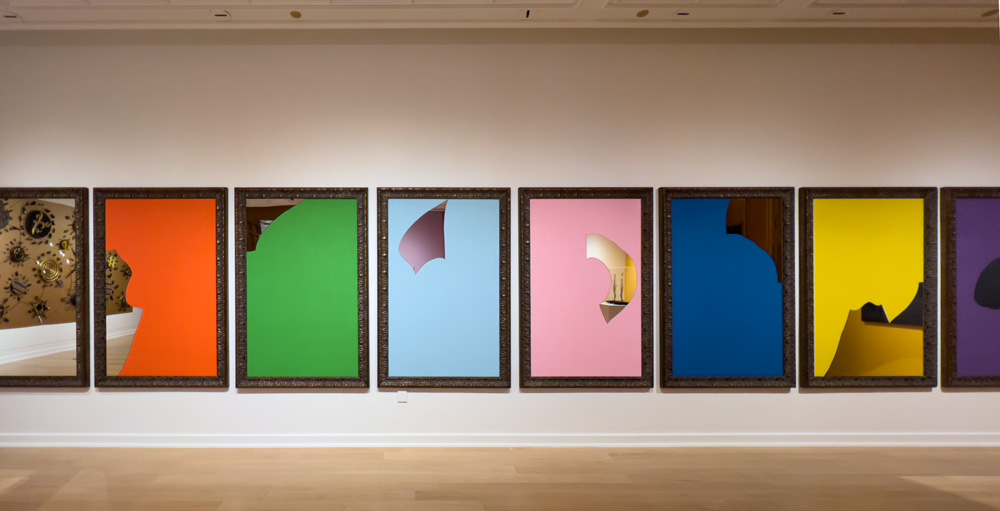 Michelangelo Pistoletto (Italian, b. 1933) Color and Light, 2017 Jute, mirrors, and gilded wood frames 8 Panels: 70 7/8 x 47 1/4 inches (180 X 120 cm). Pistoletto's controlled breaking of mirror creates a puzzle that expands and combines across eight panels. One panel showcases a network of cracks that come together to create a solid fractured mirror, while each of the remaining seven panels repeat the network of outlines, placing a single form on a deeply saturated background. "...every person is a piece of the mirror, just as every person is a piece of society. Society is like a big mirror."